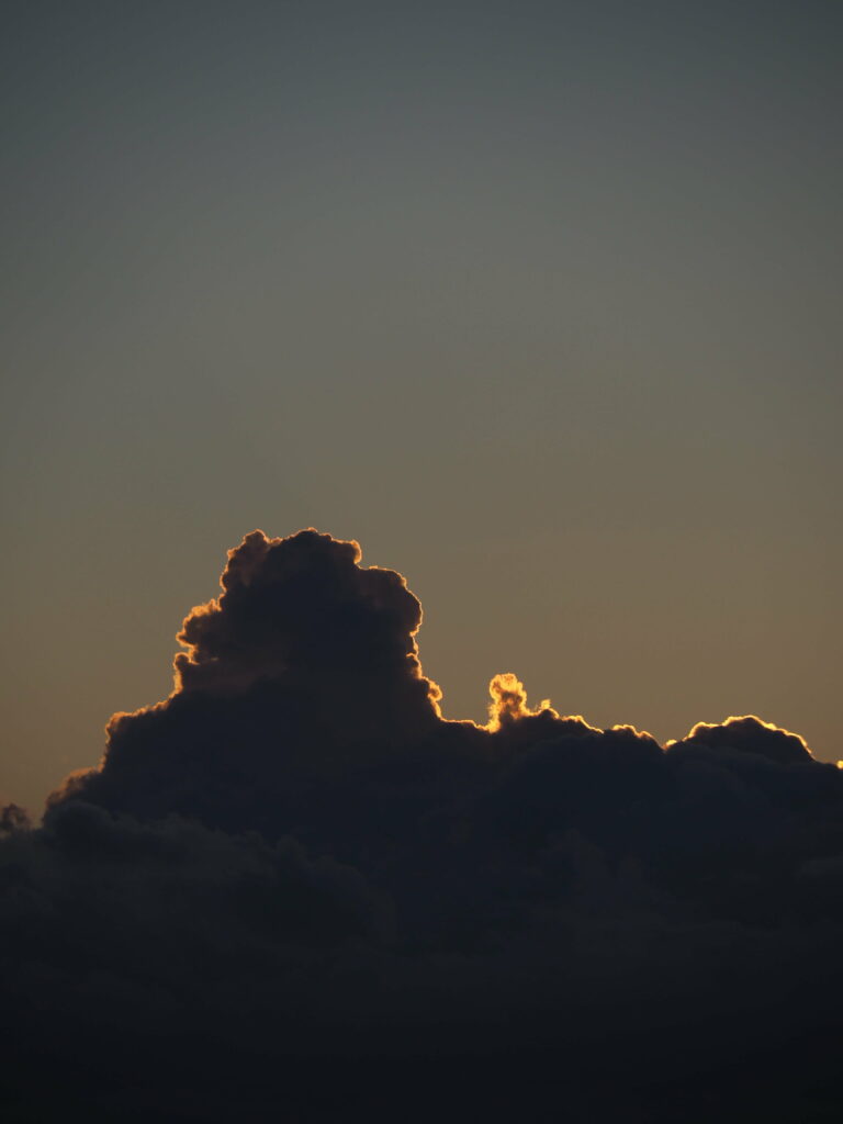 Stunning Sunset HD Phone Wallpaper with Dramatic Clouds & Shadows
