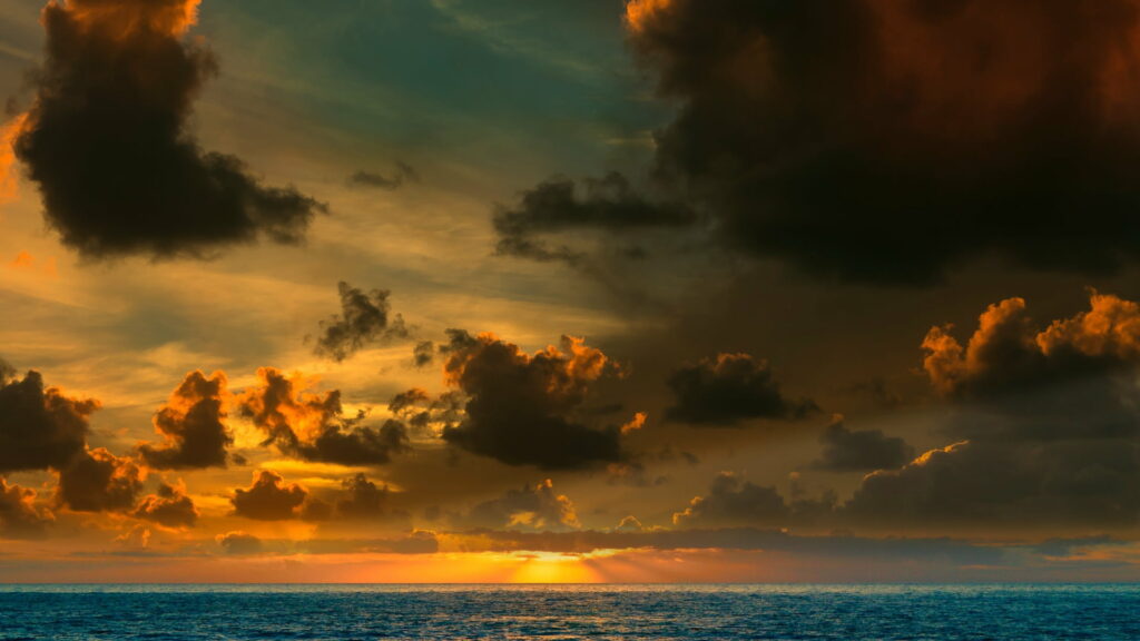 Stunning Sunset Over Ocean - Vibrant HD Wallpaper Background