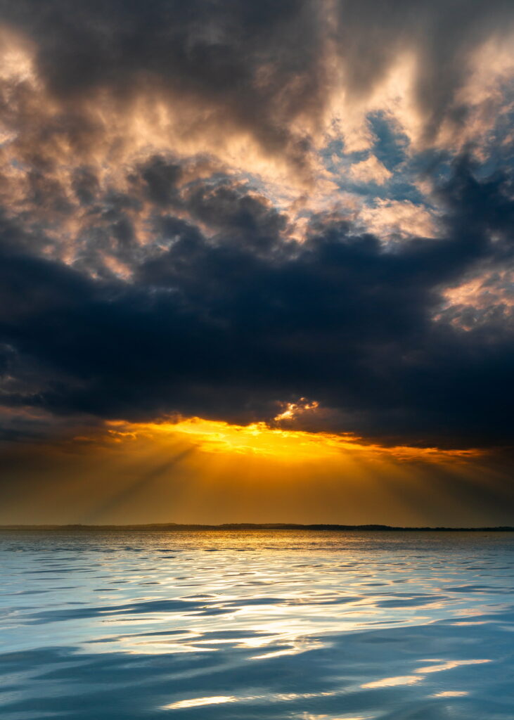 Stunning Sunset Lake Wallpaper: Dramatic Clouds & Golden Horizon