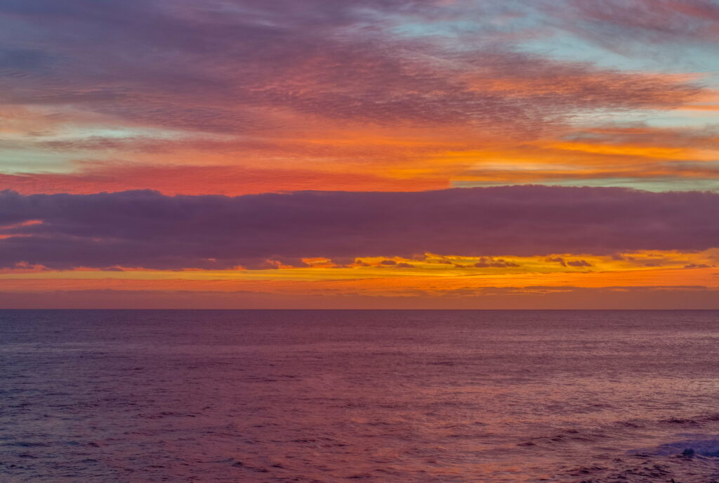 Stunning Sunset HD Wallpaper: Vibrant Orange & Pink Seascape Background