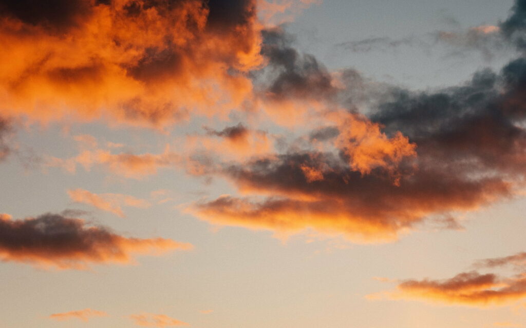 Vibrant Sunset Sky HD Wallpaper: Stunning Orange & Red Clouds