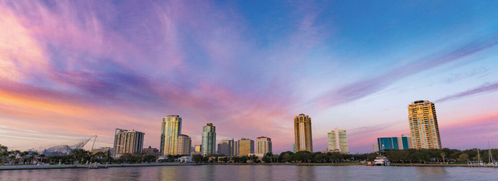 St. Petersburg Sunset: Vibrant Skyline Ultra-Wide Wallpaper Background