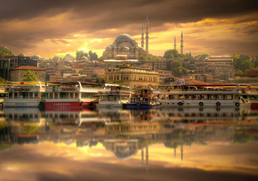 Surreal City Wallpaper: Historic Architecture & Serene Waterfront Sunset