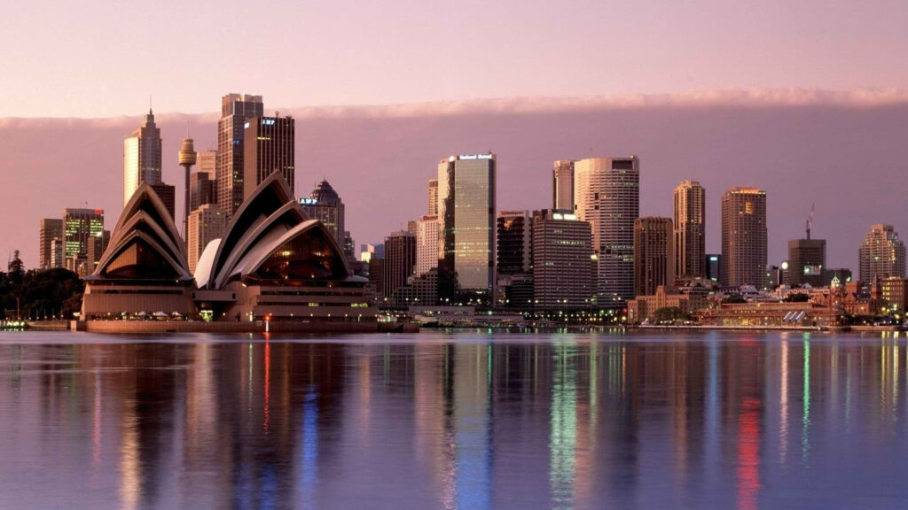 Stunning Sydney Opera House Sunset Reflection - Urban Charm Wallpaper