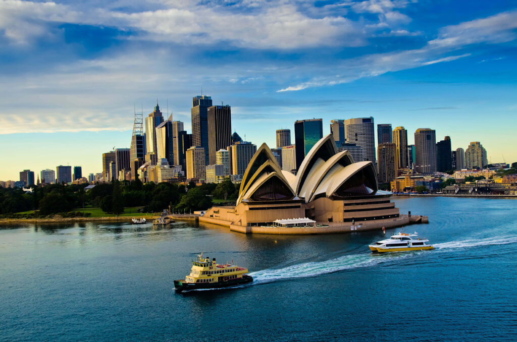 Stunning Sydney Opera House & Skyline Wallpaper with Ferries