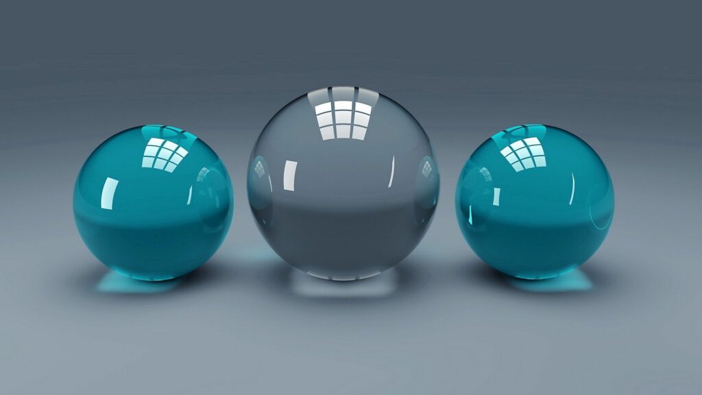 Captivating Teal Glass Balls Wallpaper - Smooth Reflective Background