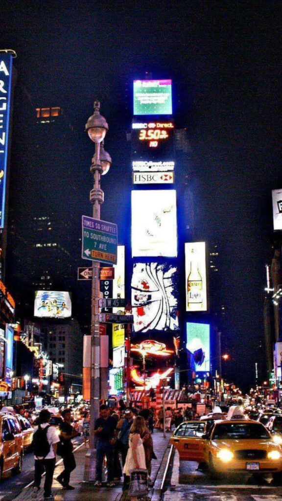 Lively NYC Times Square Night View Wallpaper: Bright Billboards & Taxis