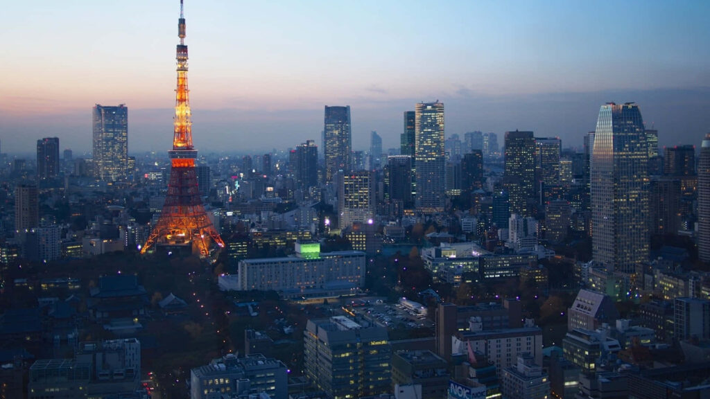 Tokyo Dusk: Illuminated Tokyo Tower Skyline Wallpaper Background