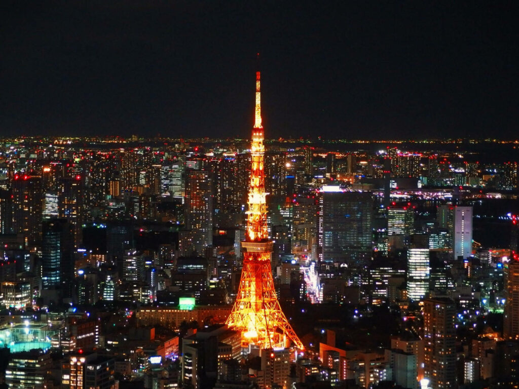 Vibrant Tokyo Night Cityscape Wallpaper with Illuminated Skyscrapers