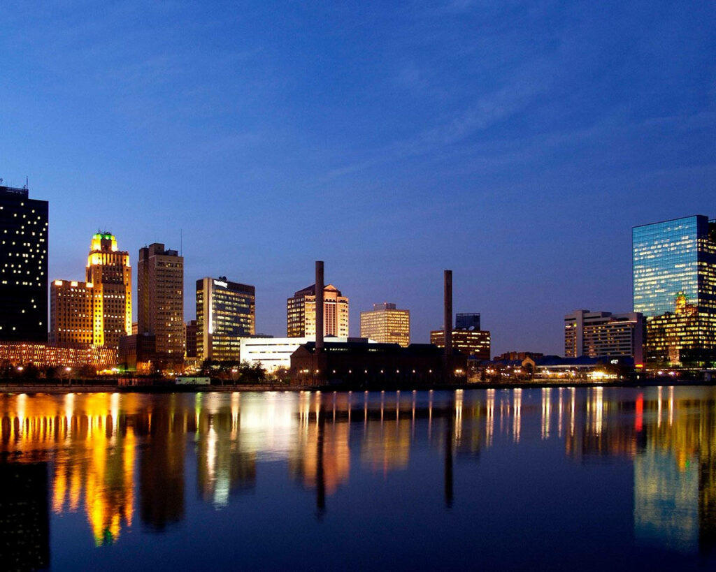 Stunning Toledo Skyline at Night: Illuminated Wallpaper Background