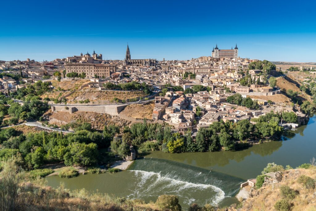 Stunning Toledo Wallpaper: Panoramic Cityscape over Tagus River