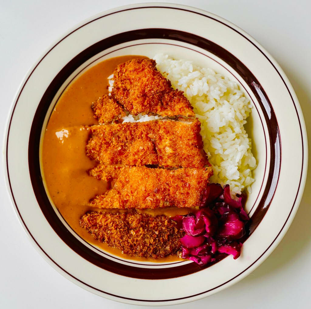 Stunning Tonkatsu Cutlet Wallpaper with Rice & Curry Sauce