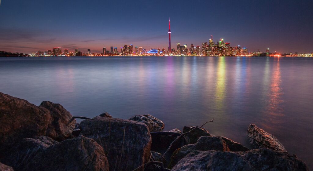 Stunning Toronto Nighttime Skyline Wallpaper with Lake Reflection