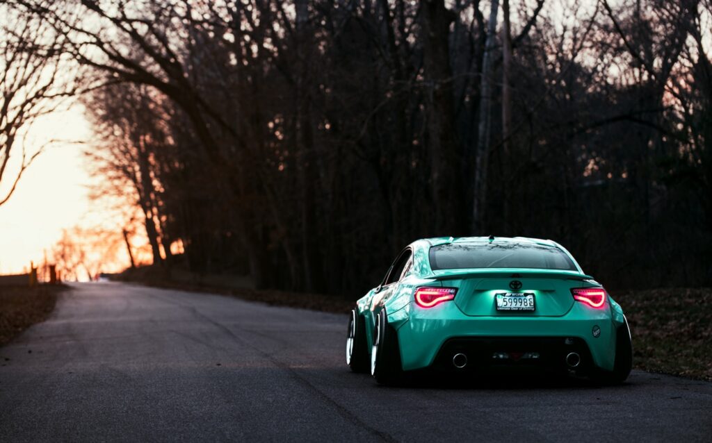 Stunning Toyota GT86 Rear View Wallpaper with Serene Evening Background