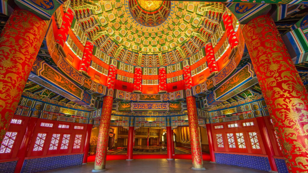Traditional Chinese Interior: Ornate Ceilings & Vibrant Wallpaper