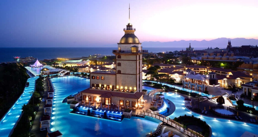 Luxurious Turkey Resort Wallpaper: Illuminated Pools & Twilight Sky