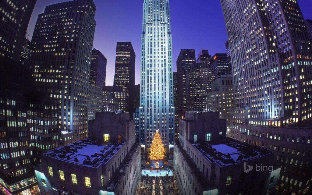 Twilight Panorama of Rockefeller Center: Illuminated Festive Cityscape Wallpaper