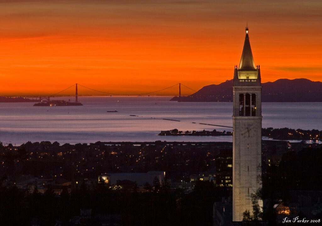 Stunning UC Berkeley Sather Tower Night Wallpaper with Sunset & Cityscape