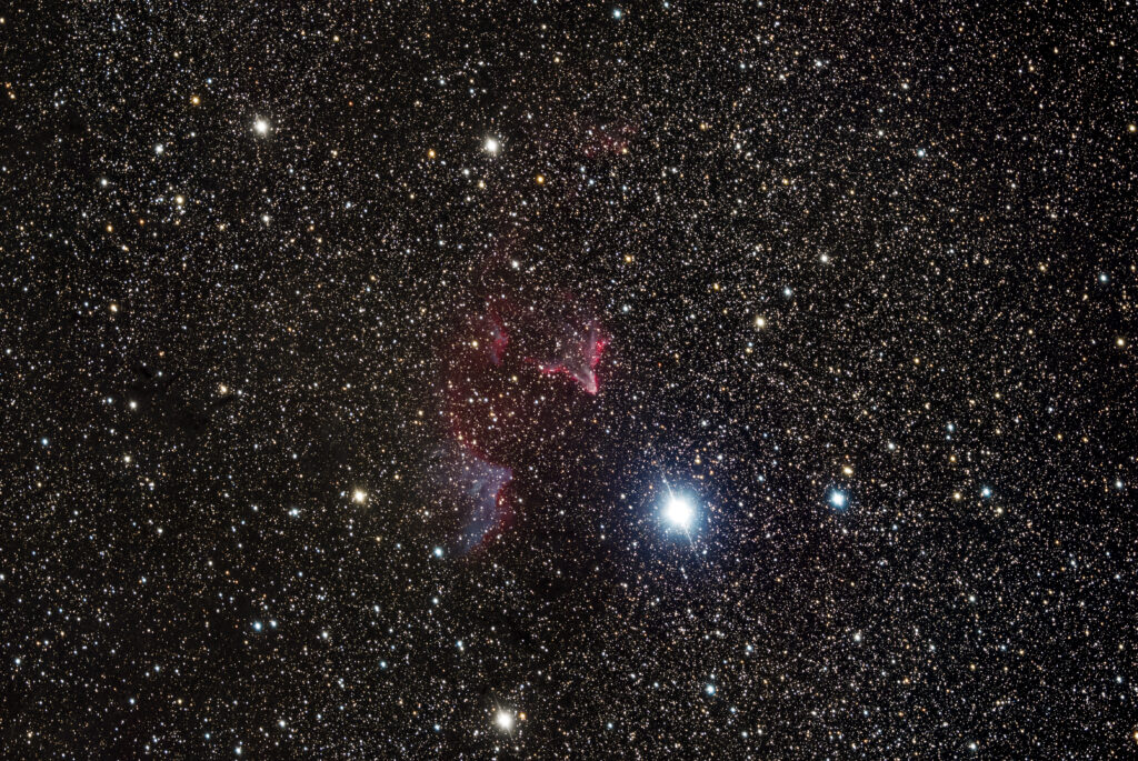 Stunning Universe Wallpaper: Twinkling Stars & Reddish Nebula
