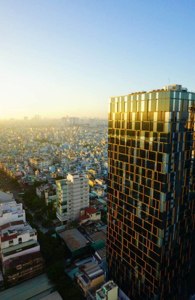 Urban Cityscape Wallpaper: Modern Architecture & Skyscraper Sunshine