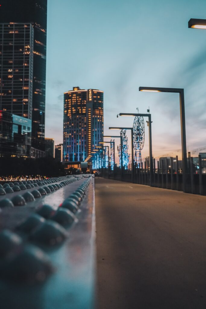 Stunning Urban Evening Wallpaper with Modern Architecture & Streetlights