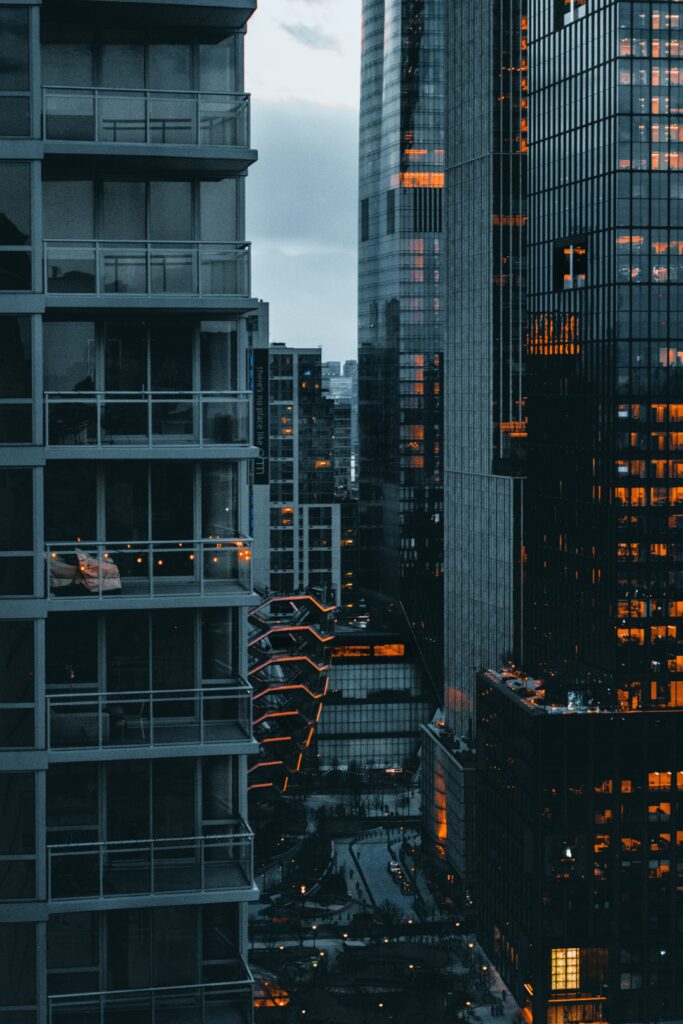 Stunning Urban Evening Wallpaper: Modern High-Rise Facades & Twilight Lights