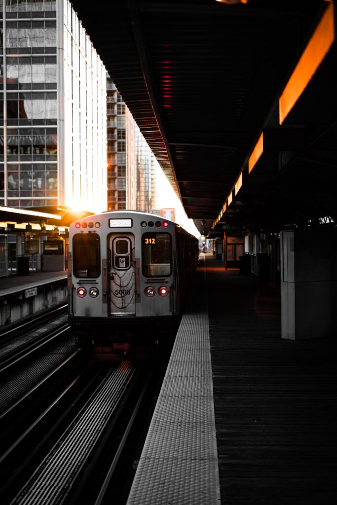 Stunning Sunset Train Wallpaper: Urban Platform & Modern Architecture