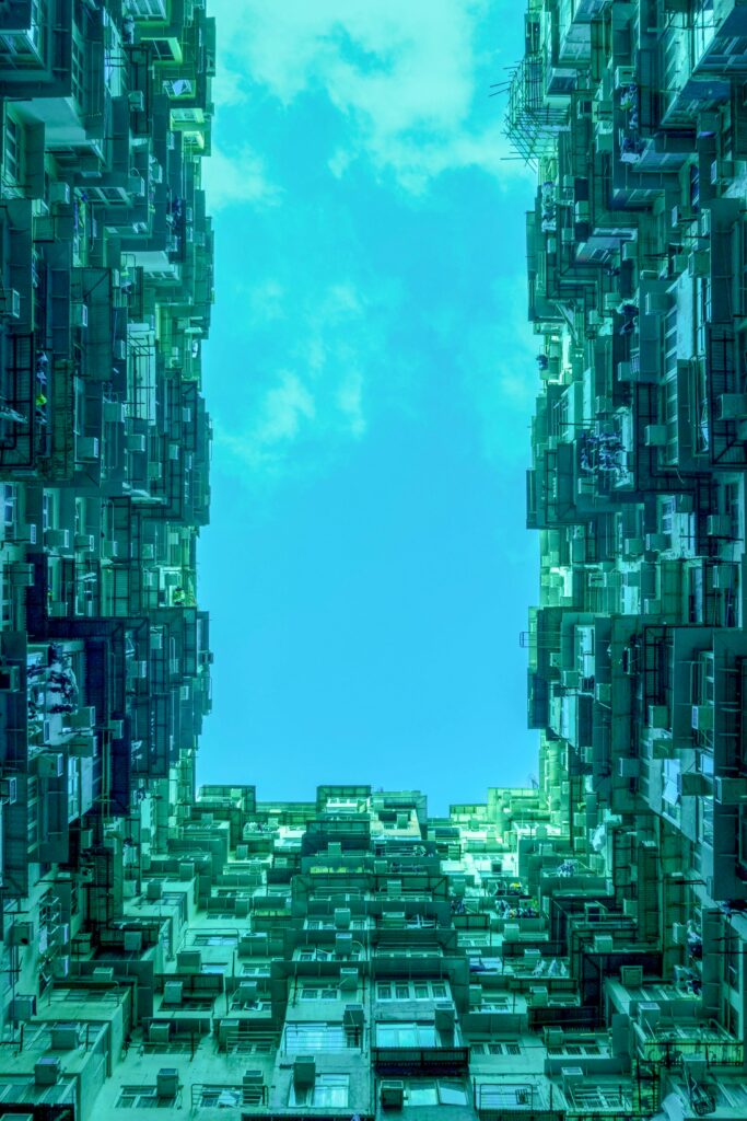 Stunning Urban Wallpaper: Bottom-Up View of Densely Packed Buildings