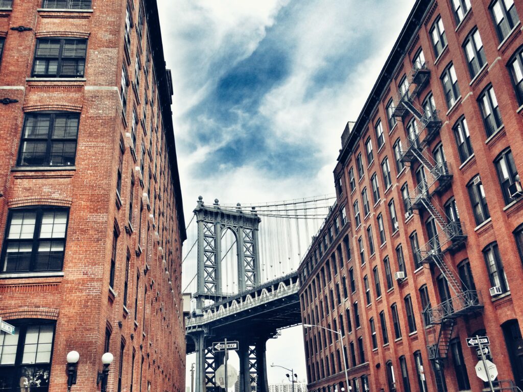Stunning Urban Wallpaper: Manhattan Bridge & Red Brick Buildings