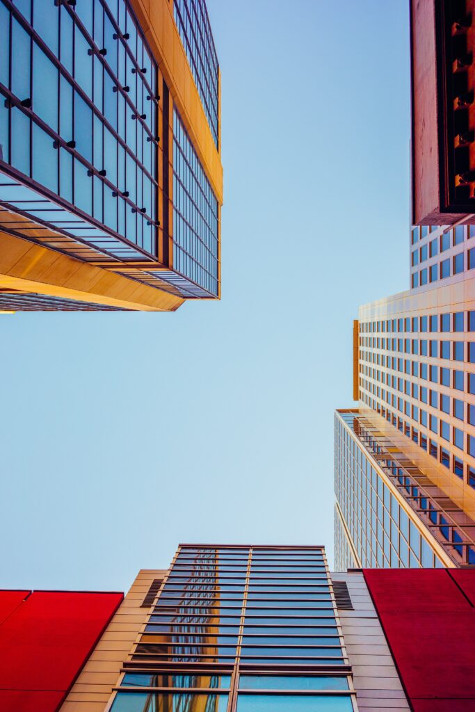 Dynamic Bottom-Up Wallpaper of Modern Buildings Against Blue Sky