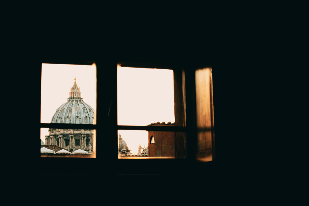 Stunning Vatican Architecture Wallpaper: Iconic Dome & Soft Sky