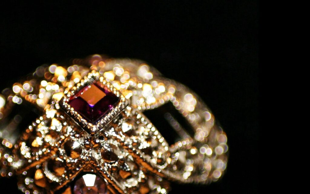 Luxurious Vintage-Inspired Wallpaper with Regal Ruby Ring Design