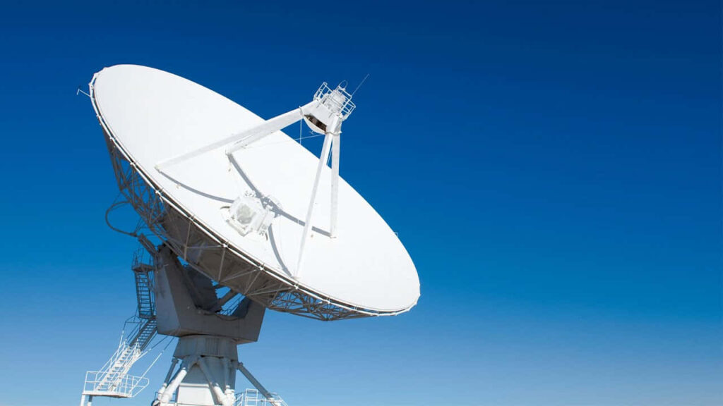 Advanced Satellite Dish Wallpaper: Modern Communication Under Blue Sky