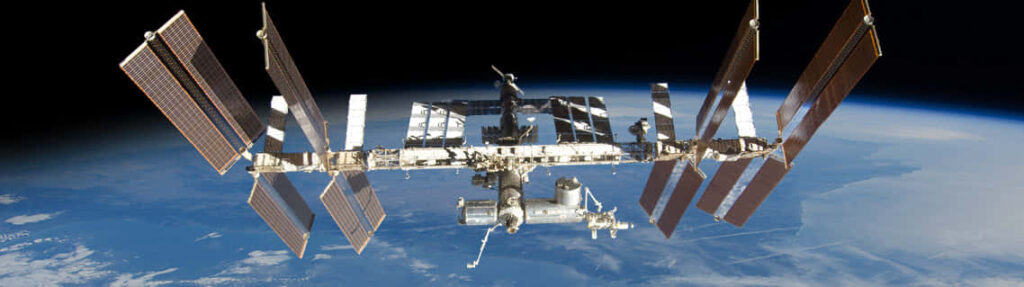 Stunning International Space Station Wallpaper Background over Earth