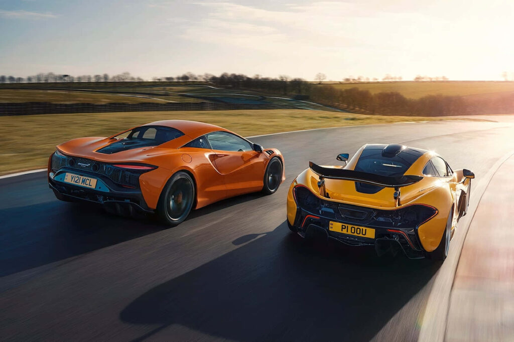Orange McLaren Sports Cars Racing Wallpaper: Speed & Luxury