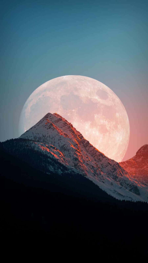 Vibrant Full Moon Wallpaper Over Snow-Capped Mountains | Serene Sky
