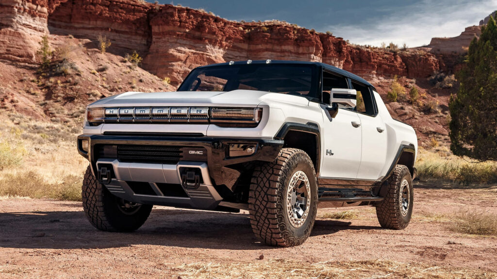 Robust White Hummer in Rugged Terrain - Adventurous Wallpaper