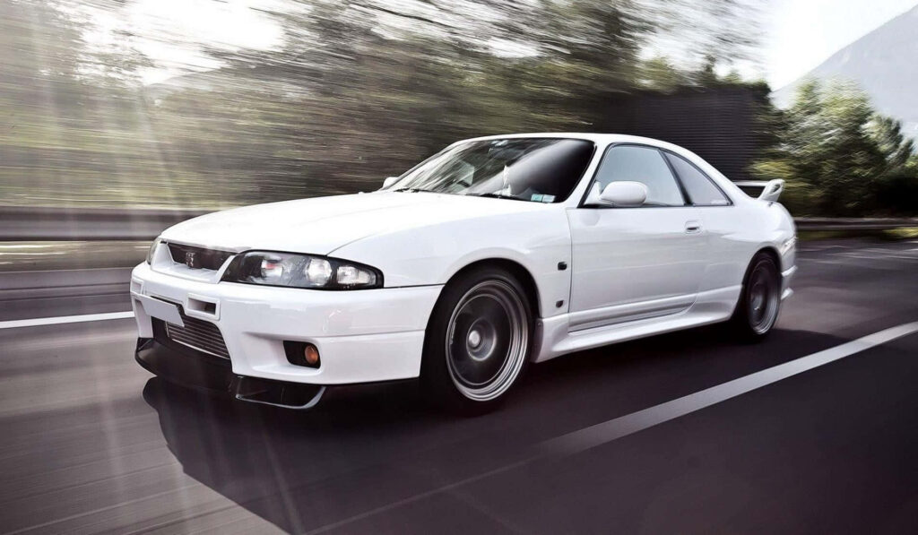 Dynamic Nissan R33 GTR Wallpaper: Speed & Style in Motion