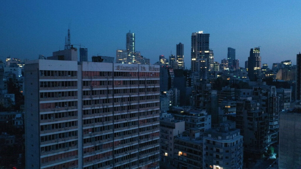 Evening Cityscape Wallpaper: Lebanon's Illuminated High-Rise Architecture