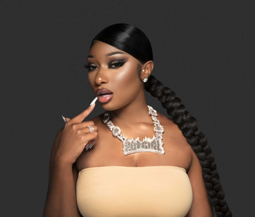 Elegant Megan Thee Stallion Wallpaper: Confidence & Style Radiate
