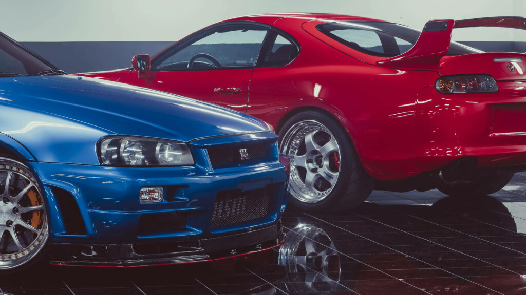 Stunning Wallpaper: Nissan GT-R R34 & Toyota Supra MK4 Side-by-Side