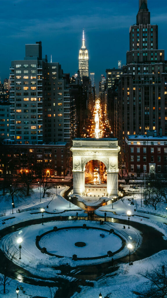 Nighttime Washington Square Park Wallpaper: Iconic Arch & Snowy Scene