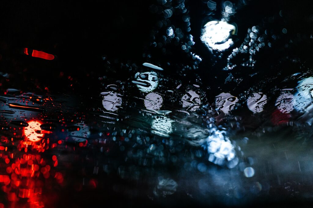 Vibrant Bokeh Wallpaper with Water Droplets and Moody Lighting