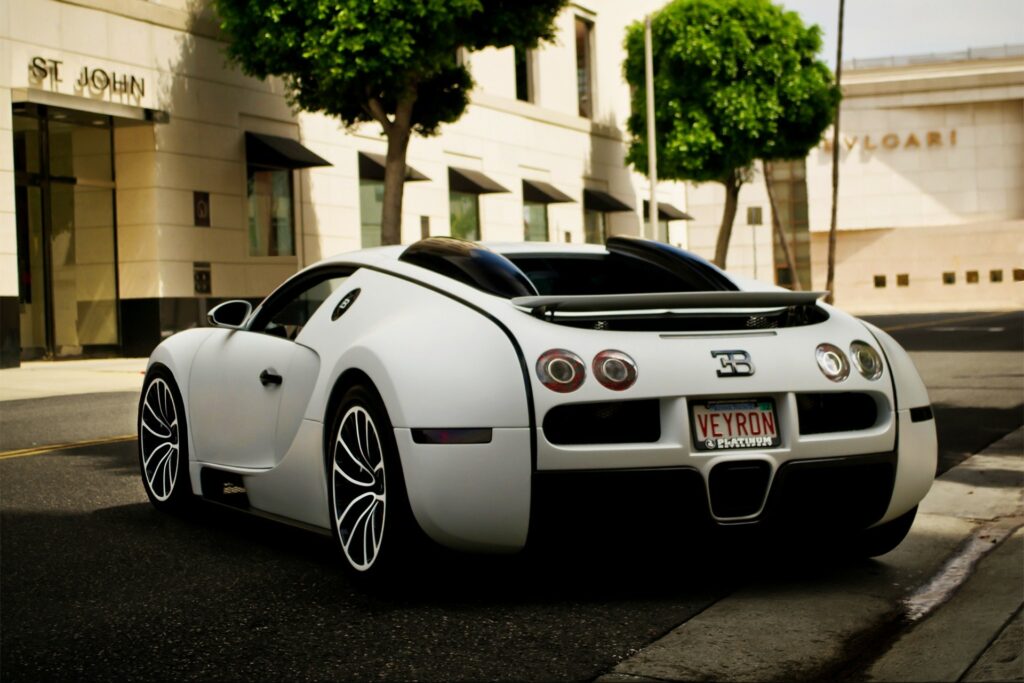 Stunning White Bugatti Rear View Wallpaper: Urban Luxury Design