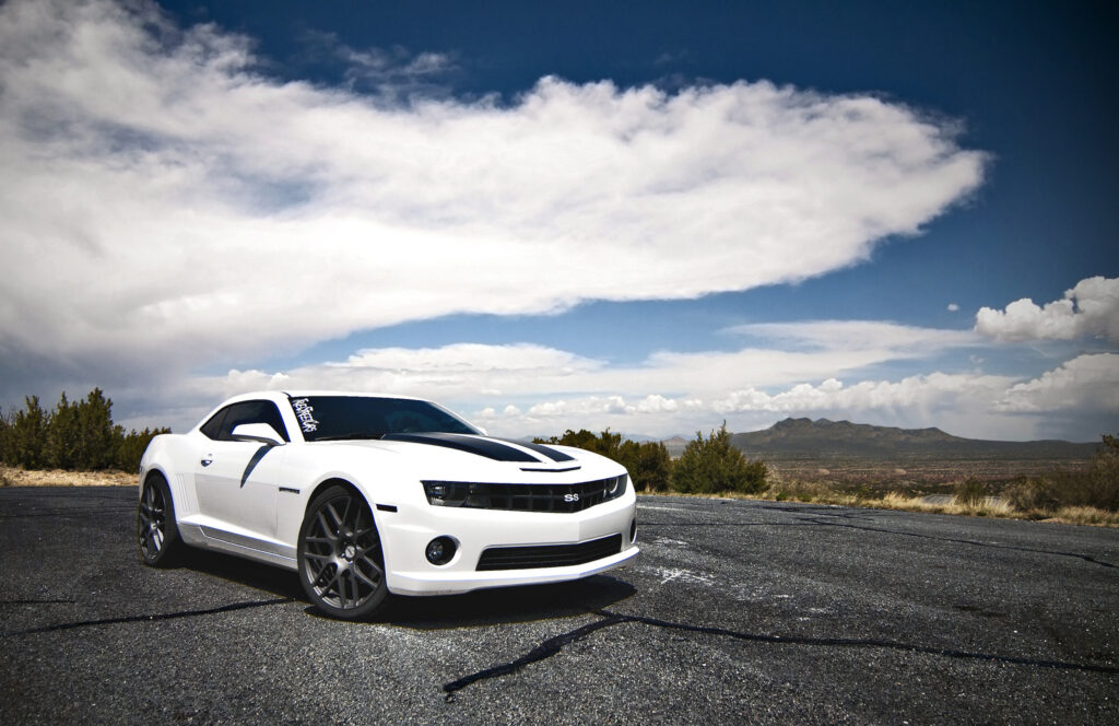 White Chevrolet Camaro SS on Open Road - Bold Design Wallpaper