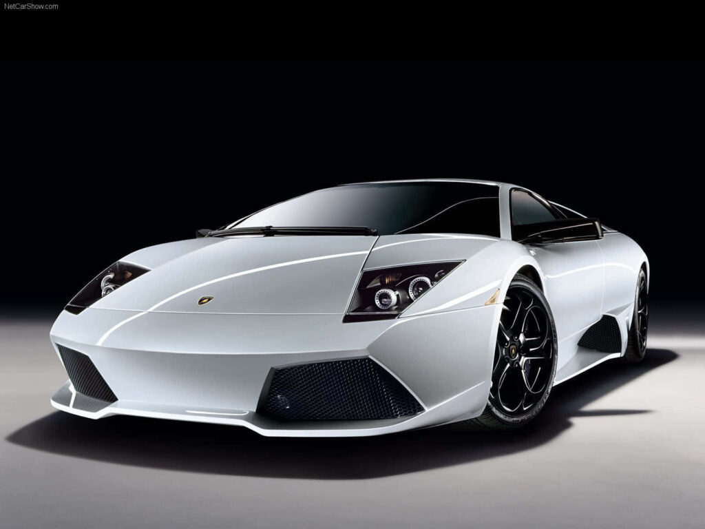 White Lamborghini model with sleek design and sharp lines on dark background car wallpaper