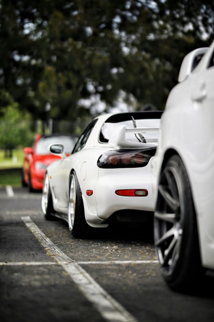 High-Res White Mazda RX-7: Stunning Rear View with Motion Blur Wallpaper