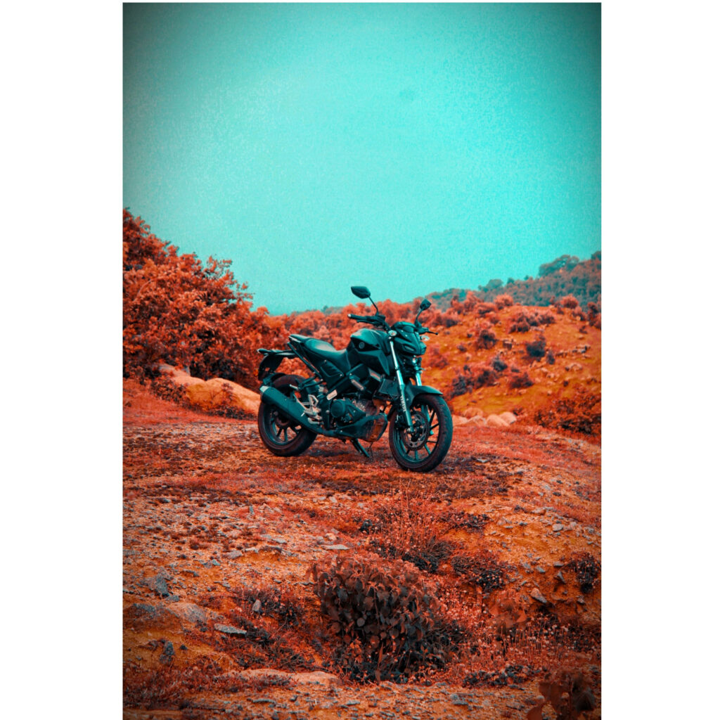 Vibrant Yamaha MT 15 on Rugged Hill | Bold Motorcycle Wallpaper