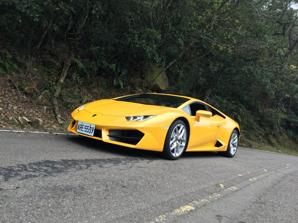 Vibrant Yellow Lamborghini Wallpaper - Sleek Sports Car Side View