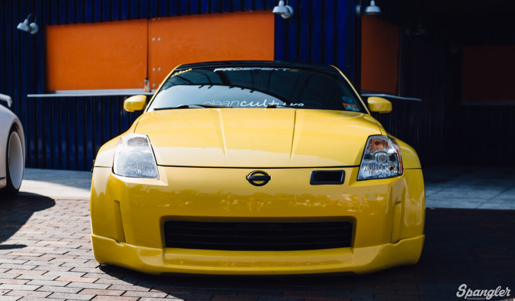 Yellow Nissan 350Z Wallpaper: Sleek Design & Tuning Modifications